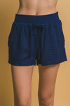 Amanda Linen Smocked Waist Shorts in Navy