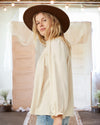 Delia Ruffle and Smocked Blouse in Natural