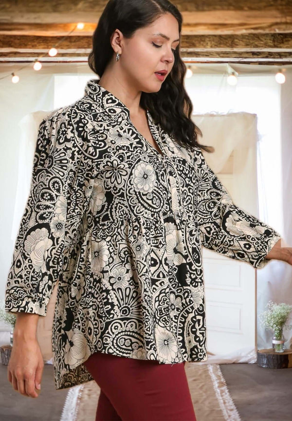 This is the Time Mixed Print Babydoll Top in Black/Tan - Curvy