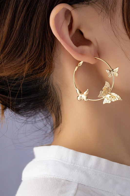 Fluttering Butterfly Adorned Hoops in Gold