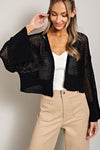 The Eyes Have It Eyelet Cropped Knit Cardigan in Black