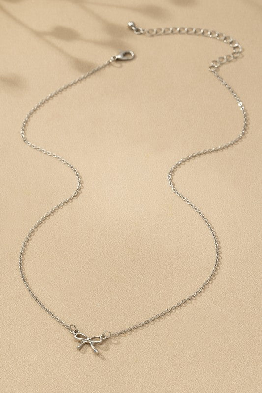 Delicate Bow Pendant Necklace in Silver