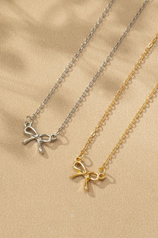 Delicate Bow Pendant Necklace in Silver