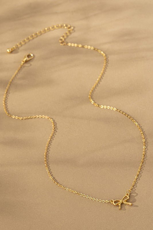 Delicate Bow Pendant Necklace in Gold