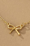 Delicate Bow Pendant Necklace in Gold