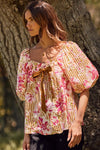 Fuchsia floral and amber striped blouse with puff sleeves and ribbon tie