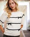 Charmed to Know You Bow Knit Top in Cream and Black