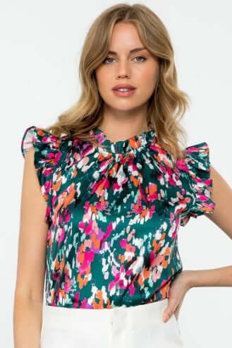 Eva Abstract Print Ruffle Trim Blouse in Teal with vibrant colors and ruffle cap sleeves, perfect for casual or dressy outfits.