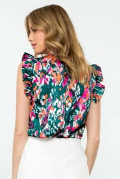 Back view of Eva Abstract Print Ruffle Trim Blouse in Teal with vibrant colors and ruffle cap sleeves, perfect for casual or dressy outfits.