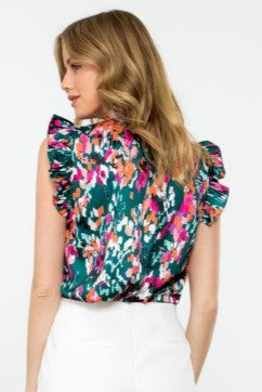 Back view of Eva Abstract Print Ruffle Trim Blouse in Teal with vibrant colors and ruffle cap sleeves, perfect for casual or dressy outfits.